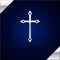 Silver Christian cross icon isolated on dark blue background. Church cross. Vector Illustration
