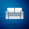 Silver Cinema chair icon isolated on blue background. Vector