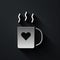 Silver Coffee cup and heart icon isolated on black background. Couple coffee for lovers on Valentines Day. Long shadow