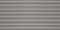 Silver corrugated iron horizontal sheets seamless pattern of fence or warehouse wall