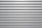 Silver corrugated metal with bolts