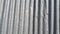 Silver corrugated metal sheet texture background