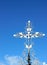 Silver cross on entrance gate of Masonic Cemetery, Canyonville, Oregon