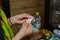 Silver cross in a woman s hand in a church.