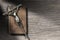 Silver Crucifix and Holy Bible on Wooden Background