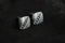 Silver cufflinks with precious stones