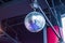 Silver disco ball in nightclub