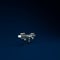 Silver Drone flying icon isolated on blue background. Quadrocopter with video and photo camera symbol. Minimalism concept. 3d