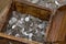 Silver Escudo coins of Portugal in a wooden box