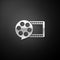 Silver Film reel and play video movie film icon isolated on black background. Long shadow style. Vector