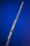 Silver Flute Isolated On Blue