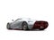 Silver futuristic race car with red metallic painted details - back view