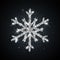Silver glitter textured snowflake icon on black background. Vector Shiny Christmas, New year and winter sparkling golden