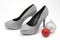 Silver glittery high heeled shoes with christmas decorations