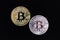 Silver and gold bitcoins on black background. Bitcoin mining concept. A two shiny coins of cryptocurrency on dark backdrop.