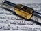 Silver and Gold Flute over sheet music