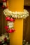 Silver and gold pedestal and Jasmine garland