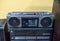 Silver gray vintage casette tape and radio machine. Tape recorder portable device