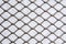 Silver grey color metal wire mesh fence with grey background