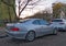 Silver grey old classic vintage veteran rusty coupe car Mercedes Benz CLK parked