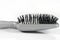 Silver hairbrush on a light background