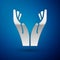 Silver Hands in praying position icon isolated on blue background. Prayer to god with faith and hope. Vector