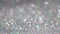 SIlver Holographic Glitter Background. Light bokeh, magic Christmas lights. Magic dust, shiny texture, holiday lights