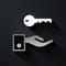 Silver Hotel door lock key icon isolated on black background. Long shadow style. Vector