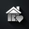 Silver House with heart shape icon isolated on black background. Love home symbol. Family, real estate and realty. Long