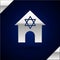 Silver Jewish synagogue building or jewish temple icon isolated on dark blue background. Hebrew or judaism construction