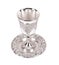 Silver kiddush wine cup and saucer on white background