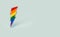 Silver LGBT lightning bolt rainbow pin pride symbol isolated on pastel green background with copy space on the right side. Sexual