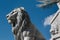 Silver Lion Sculpture and Blue Sky in background