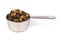 Silver measuring cup containing fruit mincemeat mix side view