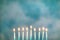 A silver menorah for the Jewish holiday Hanukkah with burning glowing eight candles