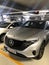 A silver Mercedes-Benz EQC 1886 special edition car is parked in a parking garage in Stuttgart