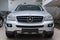 Silver Mercedes Benz ML350 M-class 2007 year front view with dark gray interior in excellent condition in a dealership with white