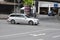 Silver Mercedes E-Class (S 212) facelift while driving on intersection in Bochum, Germany.