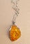 Silver pear amber pendant