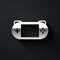 Silver Portable video game console icon isolated on black background. Gamepad sign. Gaming concept. Long shadow style