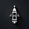 Silver Rocket ship icon isolated on black background. Space travel. Long shadow style. Vector