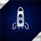 Silver Rocket ship icon isolated on dark blue background. Space travel. Vector