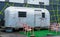 Silver RV trailer in Parking Lot