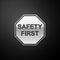 Silver Safety First octagonal shape icon isolated on black background. Long shadow style. Vector