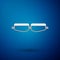 Silver Safety goggle glasses icon isolated on blue background. Vector Illustration