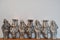 Silver Santa Claus figures standing in line