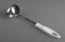 Silver sauce ladle with plastic handle