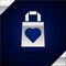 Silver Shopping bag with heart icon isolated on dark blue background. 8 March. International Happy Women Day. Vector