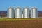 Silver silo in rural landscape