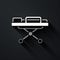 Silver Stretcher icon isolated on black background. Patient hospital medical stretcher. Long shadow style. Vector